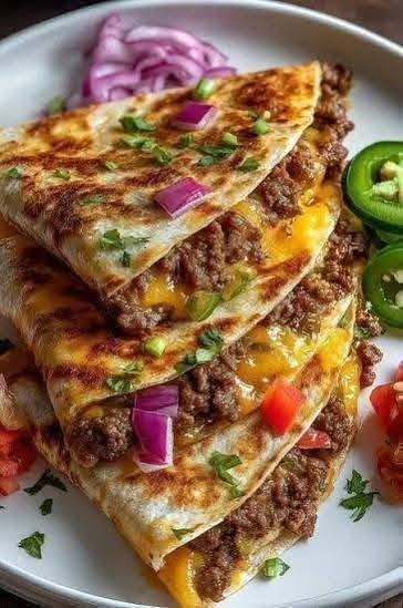 cheesy beef quesadillas with cilantro and jalapeño